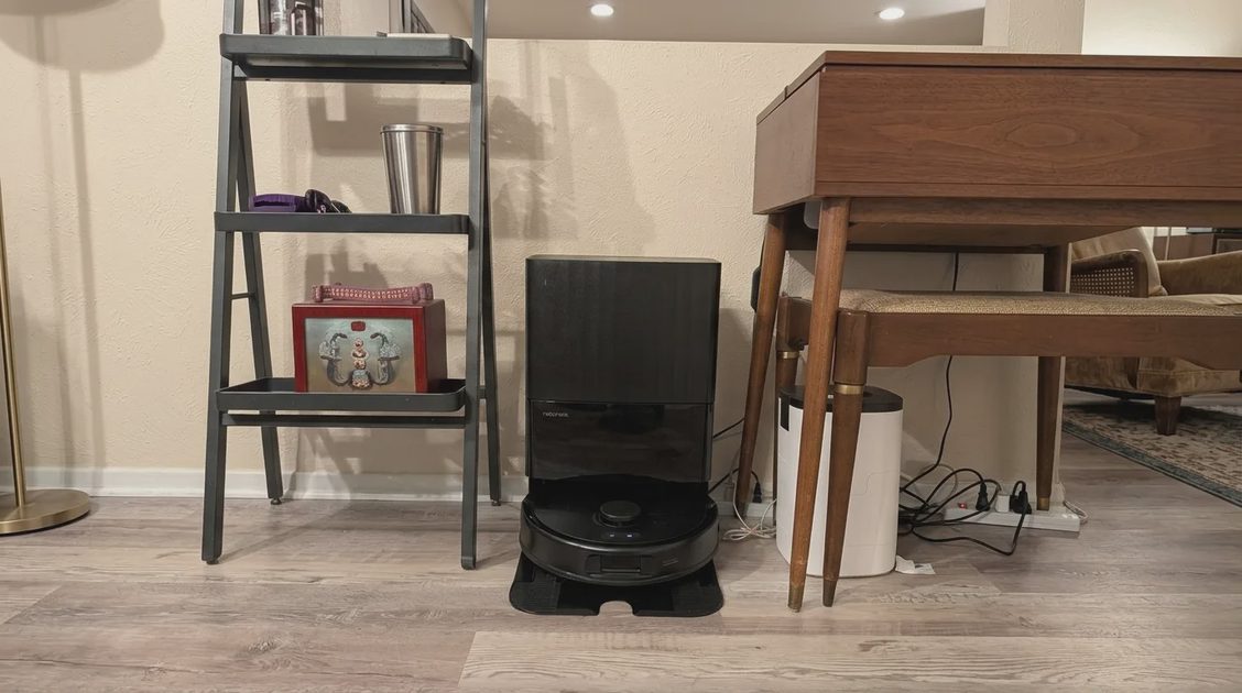 Roborock Qrevo S Pro robot vacuum with its multifunction dock